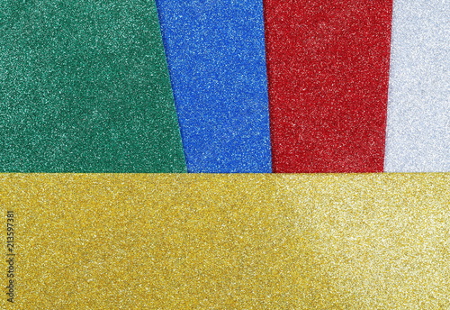 Multicolored, colorful glitter paper background and texture
