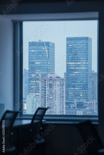 empty office and windows by night