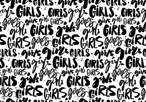 Handwritten repeated word girls. Seamless pattern with brush and ink lettering. Feminism texture, graffiti street style. Tetx background for apparel prints.