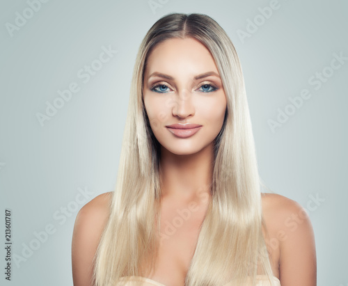 Gorgeous Woman with Fresh Skin and Healthy Blonde Hair. Facial treatment. Cosmetology, beauty, haircare and spa