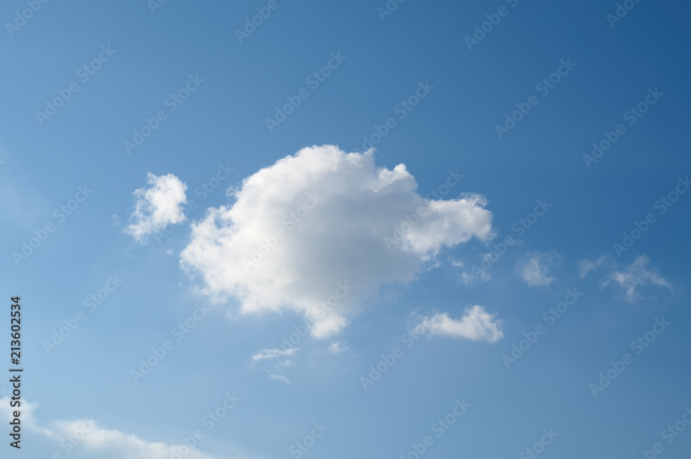 Blue sky with one white cloud background. Landscape sky. Blue sky with one white cloud background. Landscape sky.