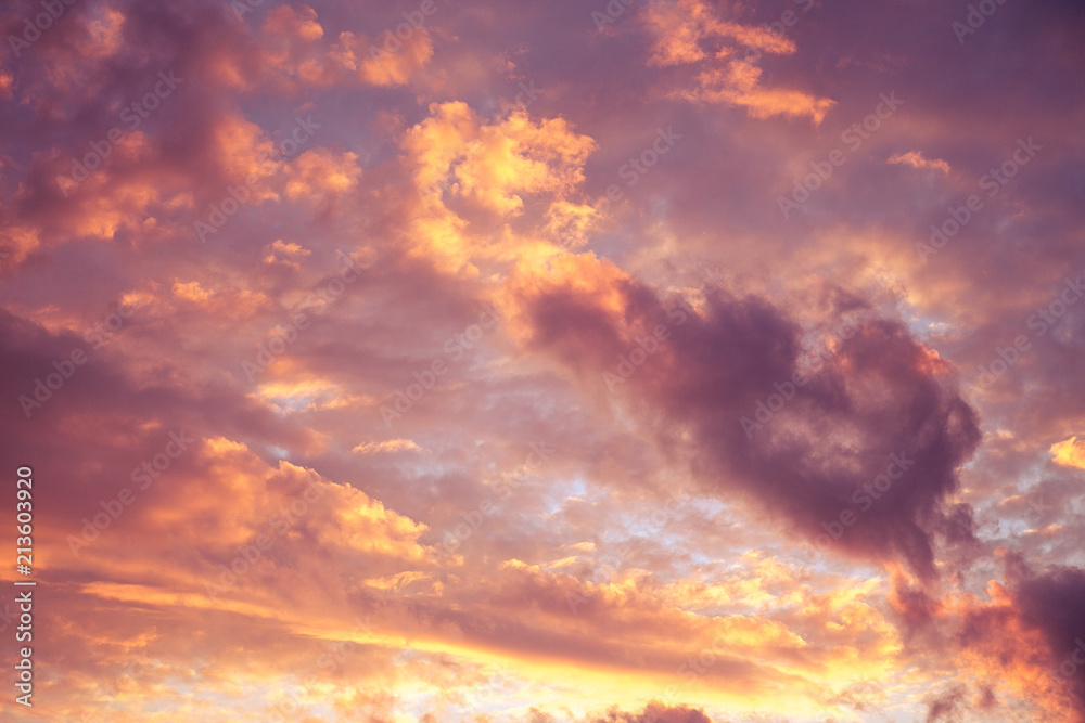 Rose-golden sunset sky with clouds