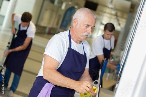 people cleaning the office as a job © auremar