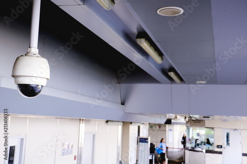 CCTV security camera operating in home. Image of CCTV security camera on background. CCTV ball on safe ground. 