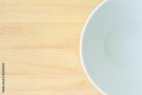 white bowl in kitchen on wood table