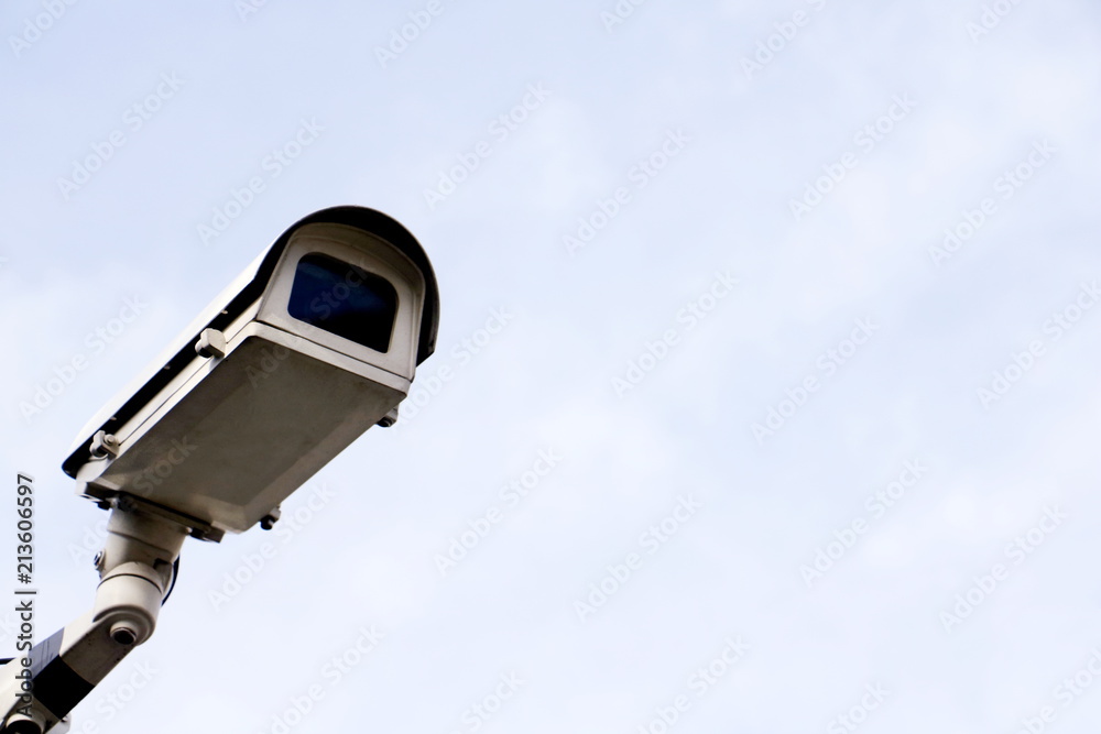 CCTV security camera operating in home. Image of CCTV security camera on white background. CCTV security camera operating in home. Image of CCTV security camera on white background.