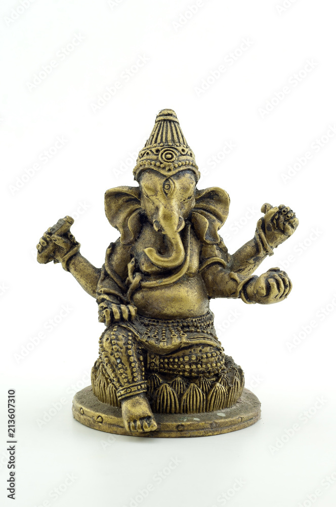 Gilded figure of the elephant Ganesha on white background