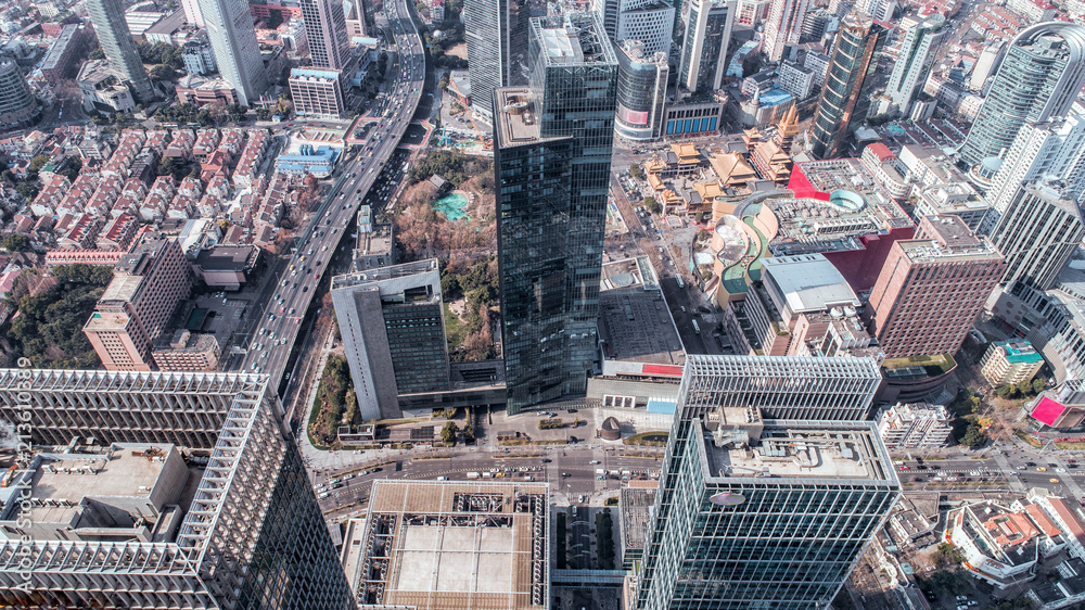 Fototapeta premium Aerial View of business area and cityscape in west Nanjing road, Jing`an district, Shanghai