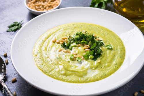 Cream soup with zucchini, herbs and cream.