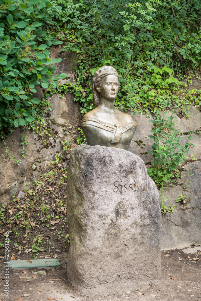 Trauttmansdorff Garden in Meran (Merano), Italy - june 27, 2018: the statue of the empress sissi along the boulevard in the botanical gardens of Trauttmansdorff Trauttmansdorff Garden in Meran (Merano), Italy - june 27, 2018: the statue of the empress sissi along the boulevard in the botanical gardens of Trauttmansdorff