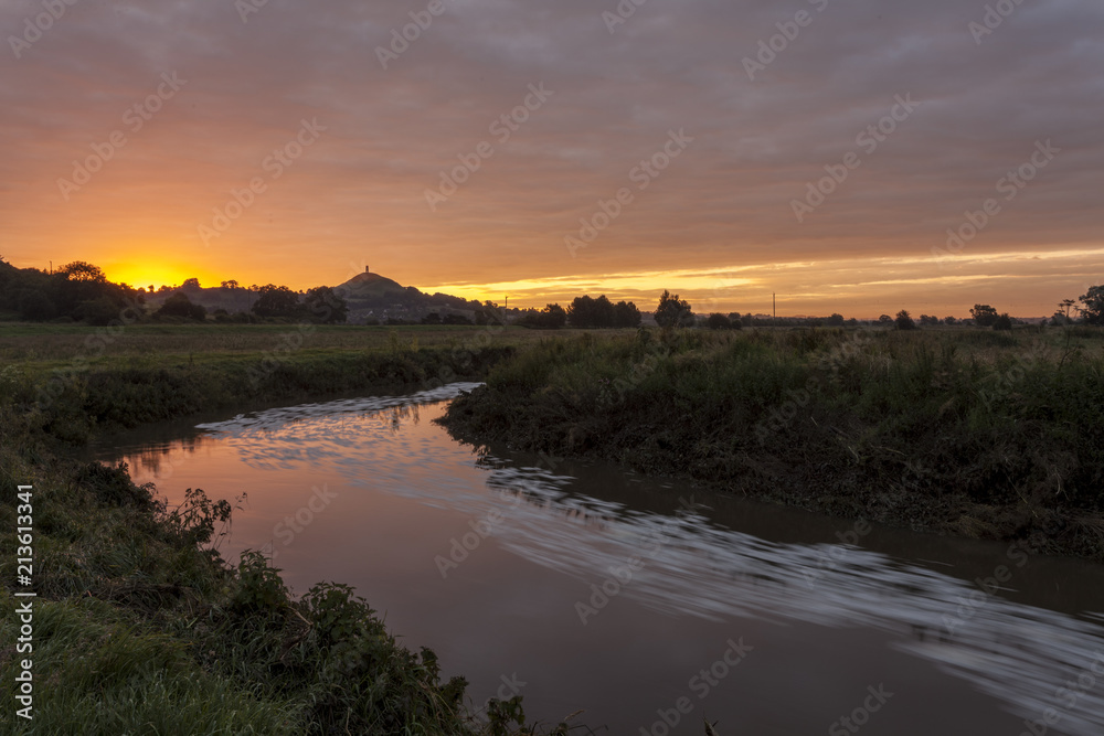 Sunrise at Glastonbury Tor from the River Brue on South Moor
