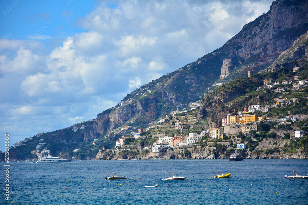A view of Amalfi Coast, Italy, a popular tourist destination on the Mediterranean sea, with the town of Atrani and boats