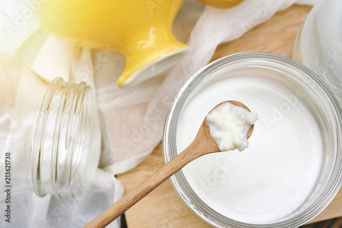 Kefir milk, Close up of hand holding kefir grains, Healthy fermented food, Probiotic nutrition drink for good balance digestive system. photo