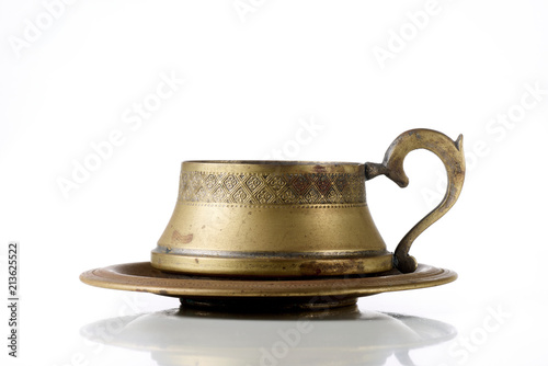 antica tazza in ottone per bevande calde