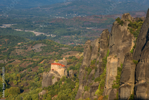 Magnificent autumn landscape.Meteora Monasteries (Holy Monastery of St. Nicholas Anapausas) on the top of rock near Kalambaka, Greece photo