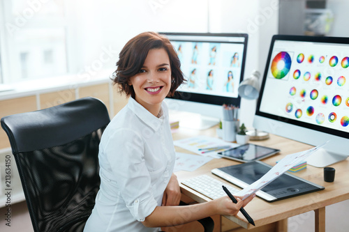 Woman Designer Working On Computer In Office