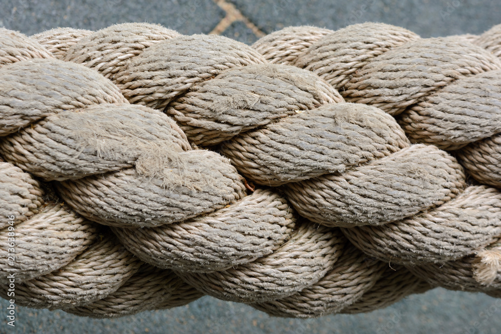 Thick rope close-up. Texture of weaving. Stock Photo