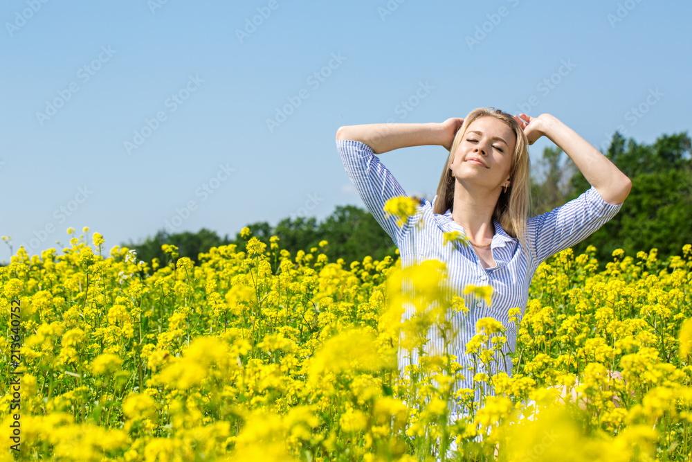 Woman enjoys the sun and nature Woman enjoys the sun and nature