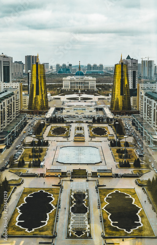 Elevated panoramic city view over Astana in Kazakhstan with Golden Towers aka the Beer Cans and presidential building Ak Orda  photo