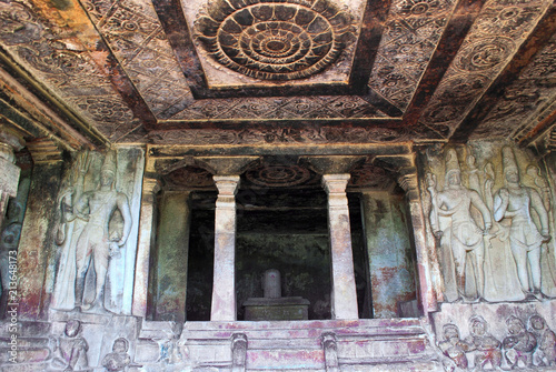 Interior view of Ravanaphadi rock-cut temple, Aihole, Bagalkot, Karnataka. Exquisitely carved ceiling of both the matapas, carved Shiva figures and the shivalinga in the sanctum is clearly seen. photo
