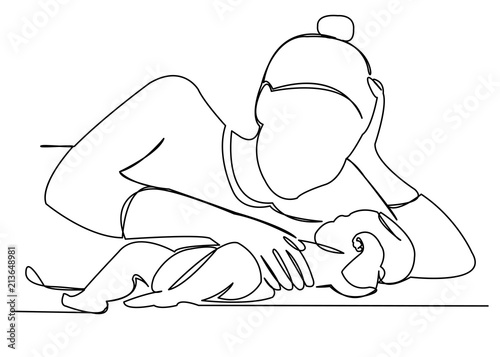 Mom with newborn baby lying on the bed