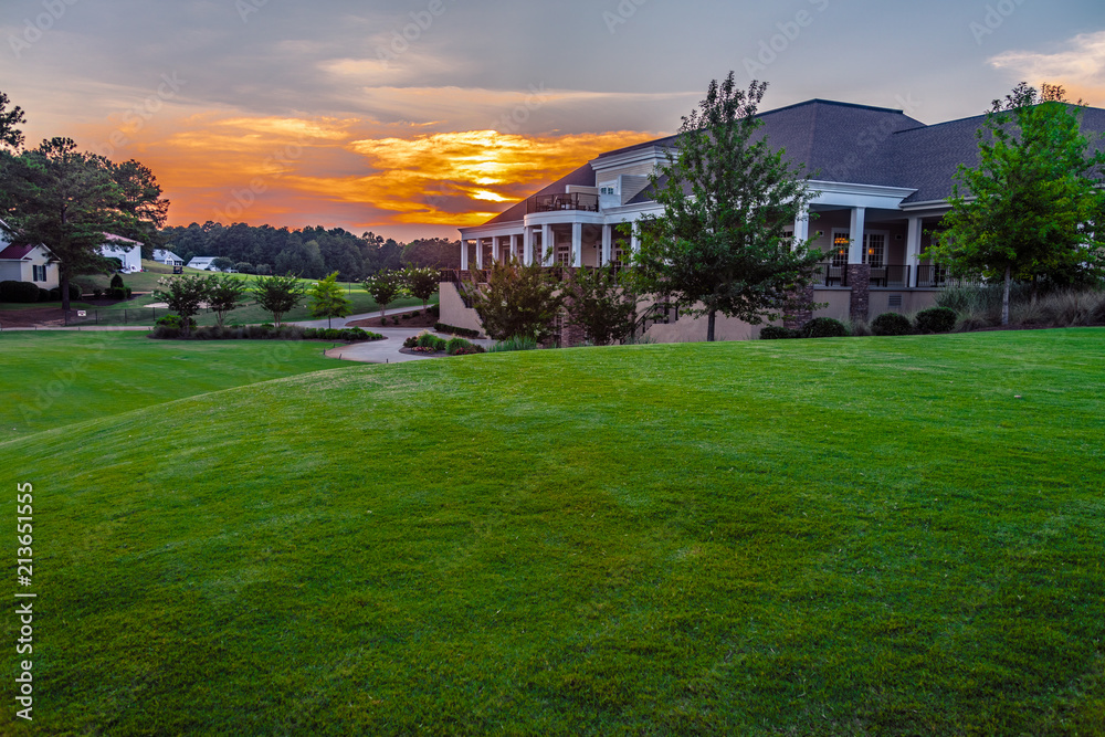 Sunset on Golf Course with Club House 18th Hole Sunset on Golf Course with Club House 18th Hole