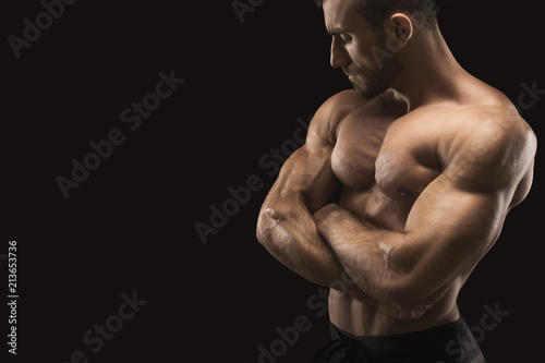 Strong athletic man with naked muscular body © Prostock-studio