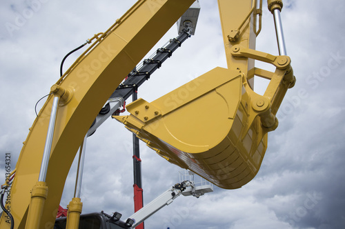 yellow excavator bucket photo