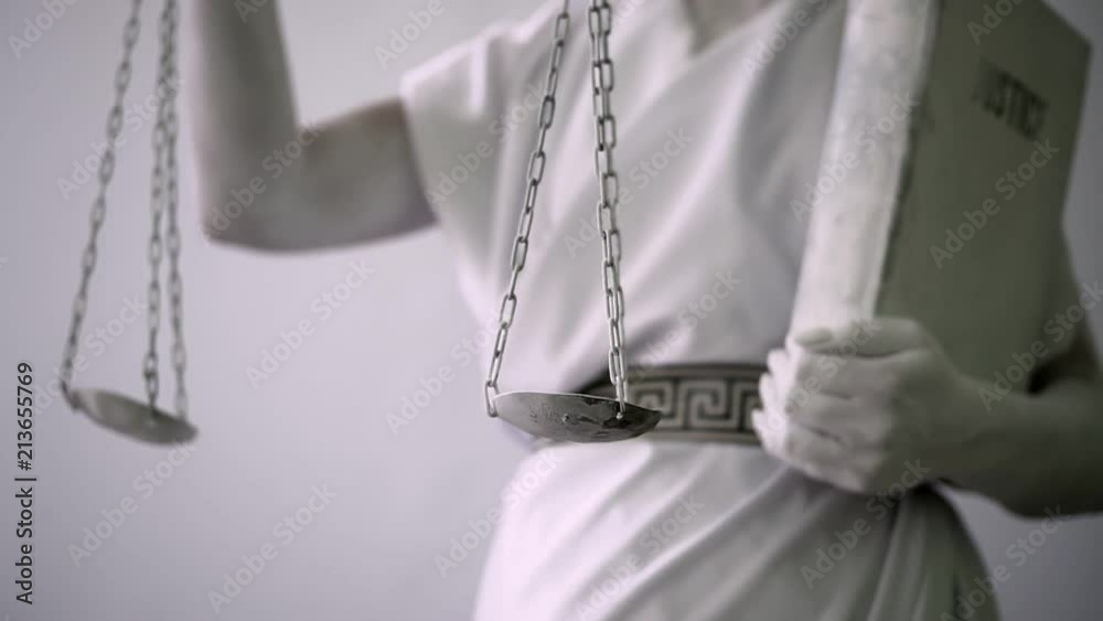 closeup portrait of a living statue. the goddess of justice is Themis
