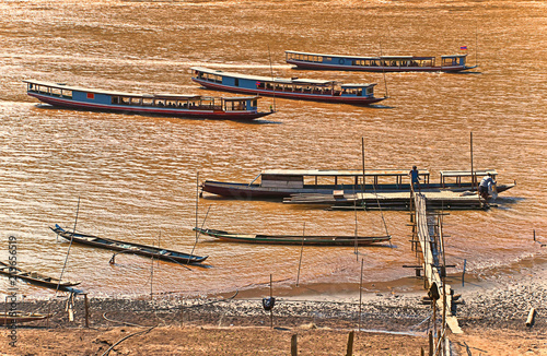 Passenger boats on the Mekong river in Laos 