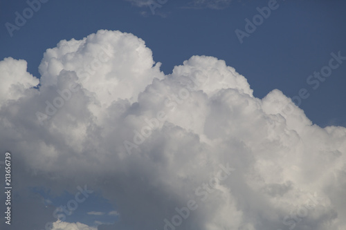 View of beautiful white clouds in a blue sky. © Александр Поташев