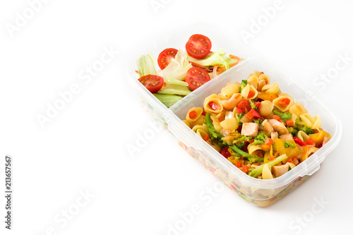 Healthy meal prep container with pasta salad with turkey and vegetables isolated on white background. Copyspace