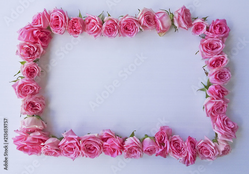 Fototapeta Naklejka Na Ścianę i Meble -  Vintage square frame of pink roses on a white background