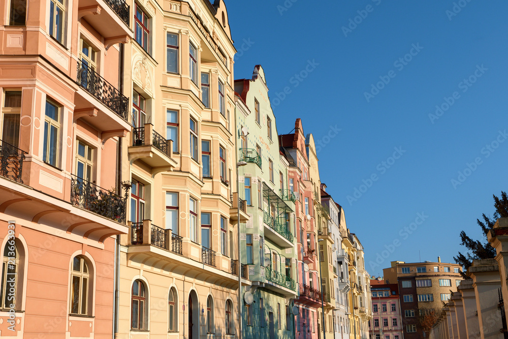 Row of colorful houses in Prague in morning light on sunny day, Czech republic