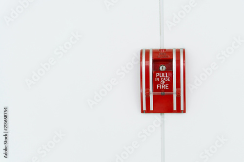fire alarm switch on the white wall, use in case of fire