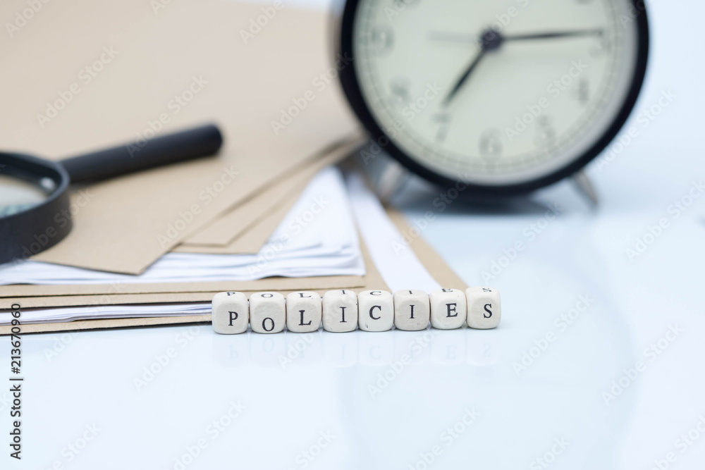 custom made wallpaper toronto digitalThe concept of policies. Words use blocks of wood on files and documents. Selective Focus.