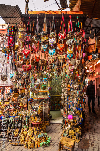 Street of Marrakesh market with traditional souvenirs, Morocco © Olena Zn