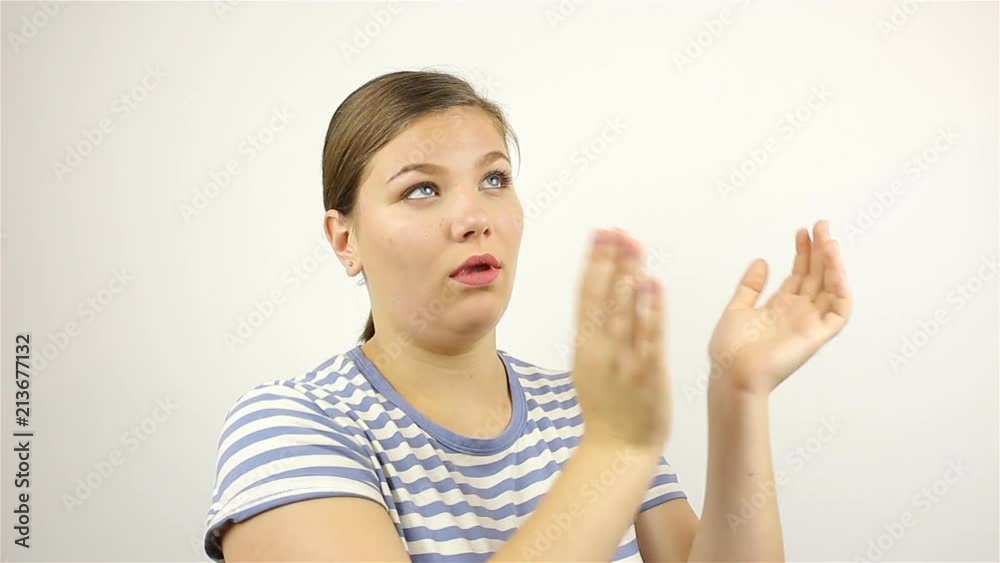 Sarcastically clapping her hands. Young beautiful woman applauding. Sarcastically clapping her hands. Young beautiful woman applauding.