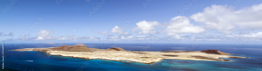 Volcanic Island La Graciosa of the Atlantic Ocean - a view from Lanzarote, Canary Islands, Spain Volcanic Island La Graciosa of the Atlantic Ocean - a view from Lanzarote, Canary Islands, Spain