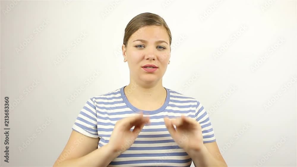 Young beautiful woman makes a loud statement, gesture Young beautiful woman makes a loud statement, gesture