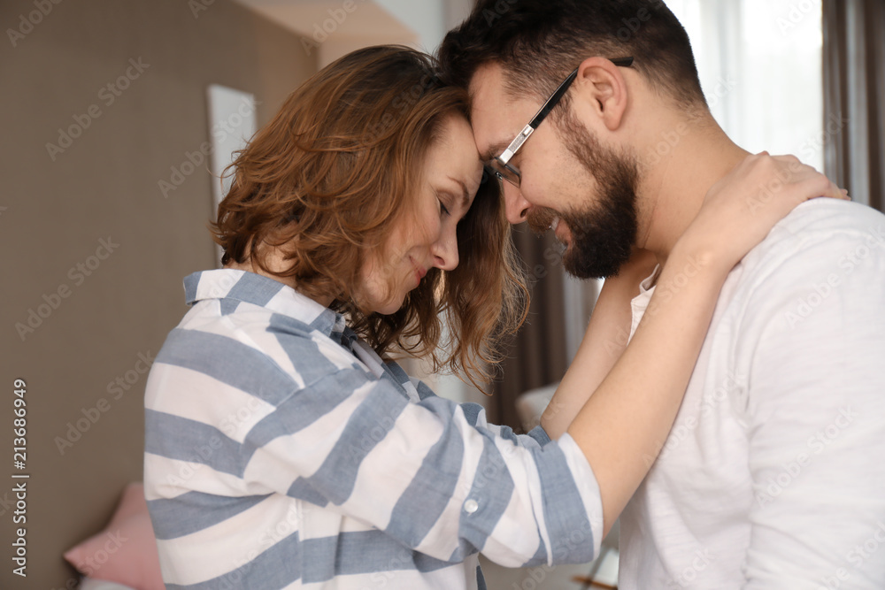 Lovely couple dancing together at home Lovely couple dancing together at home
