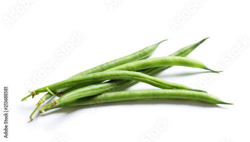 Fresh green French beans on white background