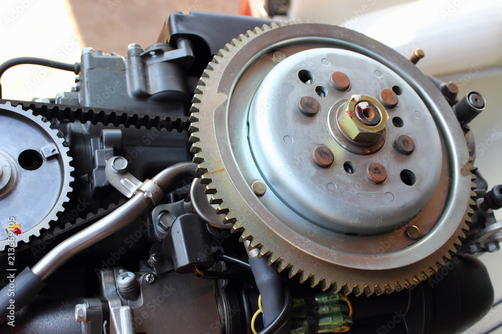 Flywheel, belt and camshaft gear - four-stroke outboard motor distribution mechanism drive Flywheel, belt and camshaft gear - four-stroke outboard motor distribution mechanism drive