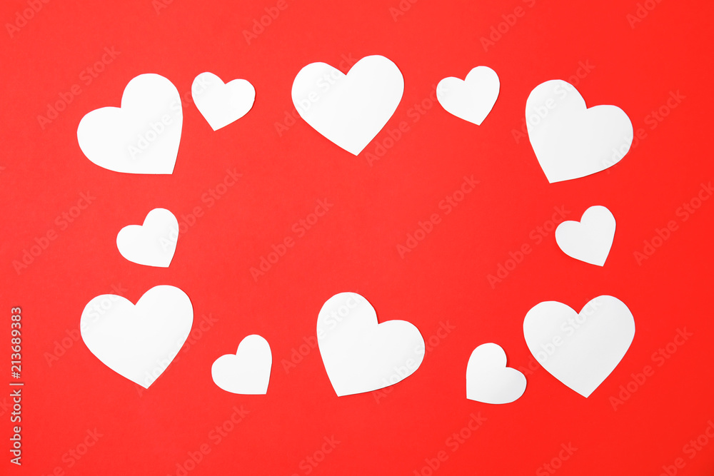 Frame made of small paper hearts on color background Frame made of small paper hearts on color background