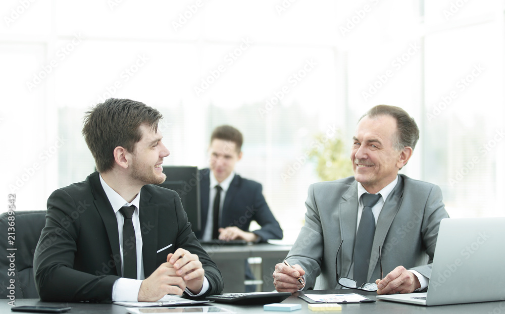 employees working with financial documents in the office employees working with financial documents in the office