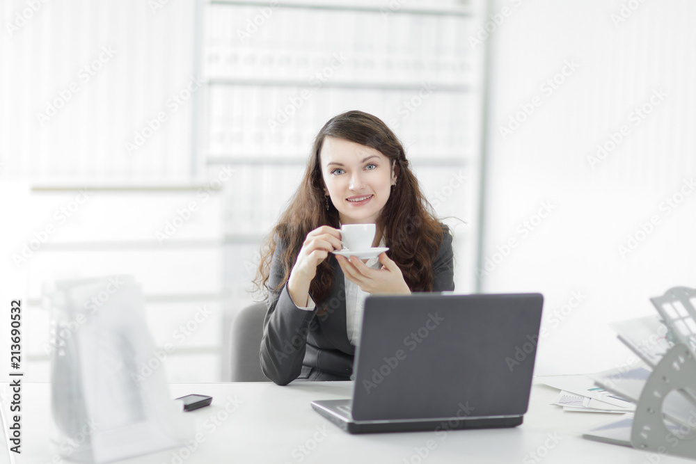 young business woman with Cup of coffee in a work break young business woman with Cup of coffee in a work break