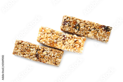 Different grain cereal bars on white background. Healthy snack