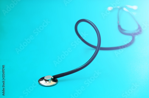 Stethoscope on doctor blue. photo