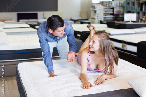 Family couple choosing mattress