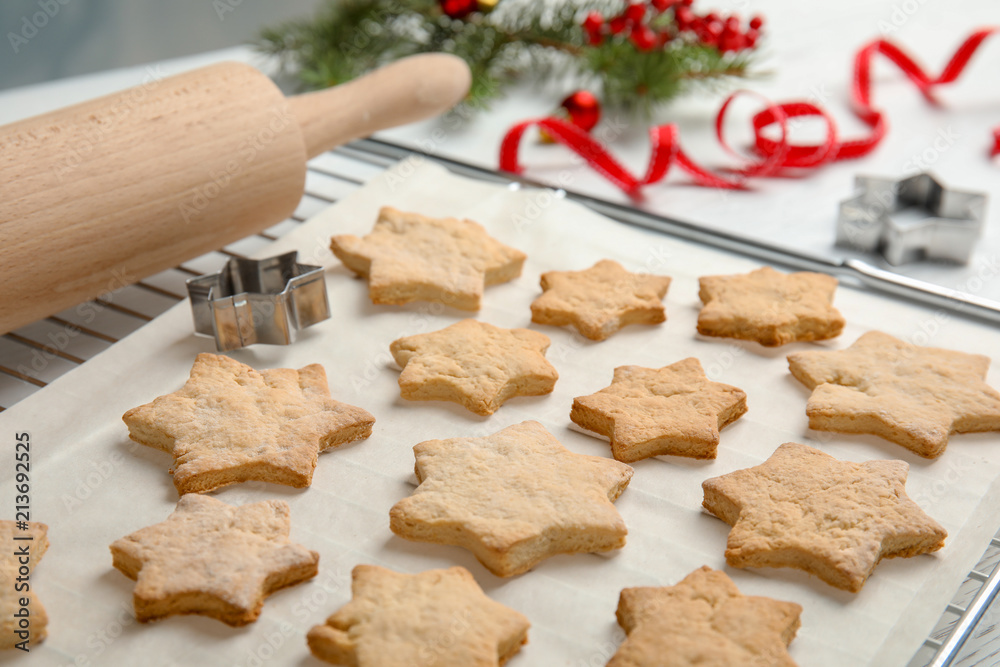 Tasty homemade Christmas cookies on baking parchment Tasty homemade Christmas cookies on baking parchment